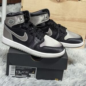 Nike Silver and Black Sneakers with Metallic Overlays